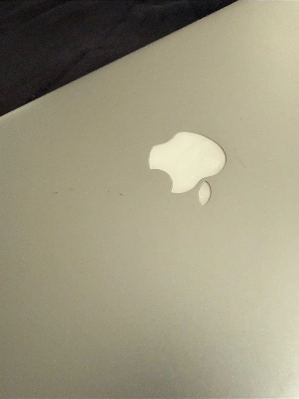 Apple MacBook Pro Silver with Black Keyboard and Blue Display